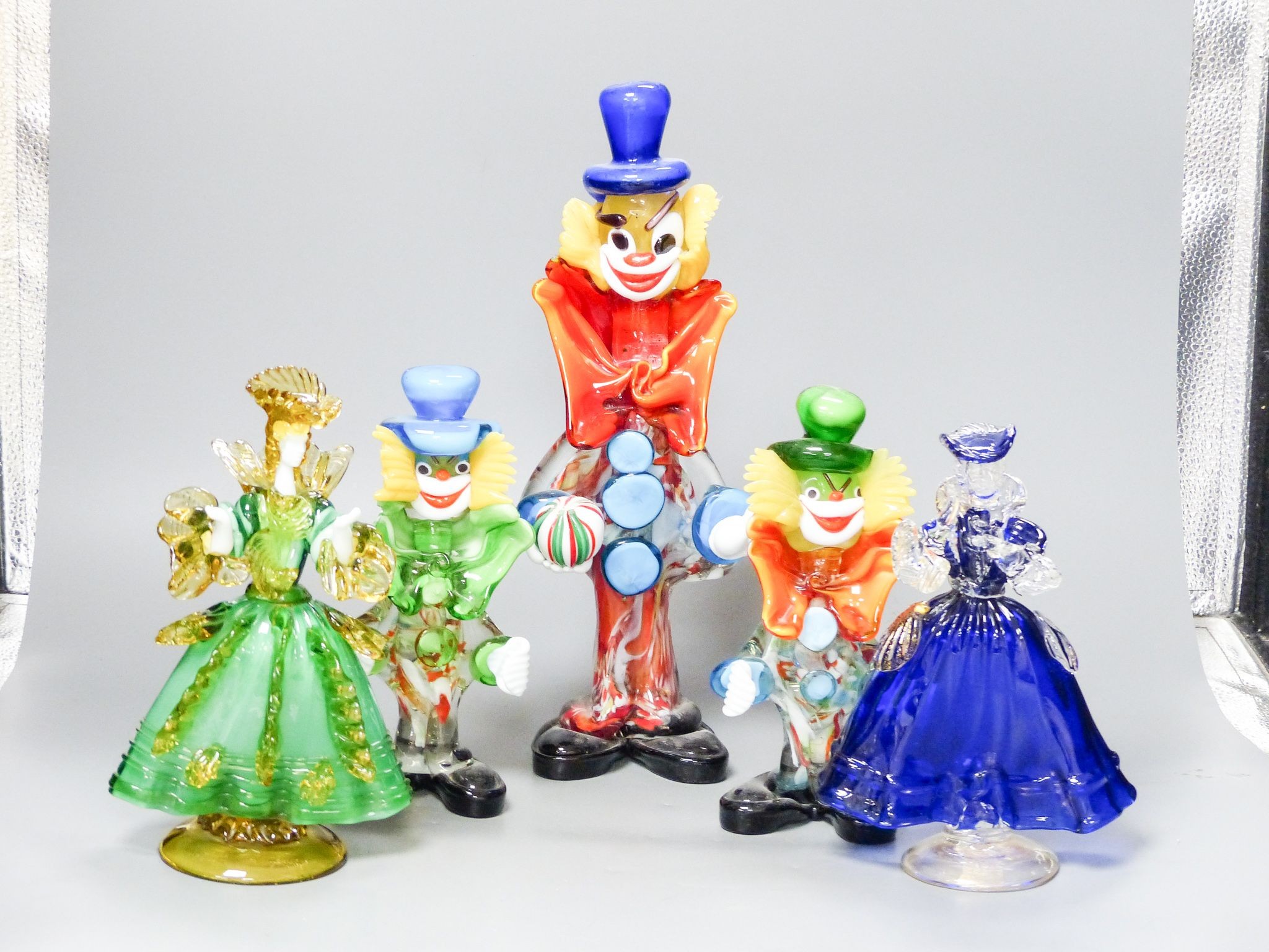 Three Murano glass figures of clowns and two similar figures of ladies, tallest 34 cm